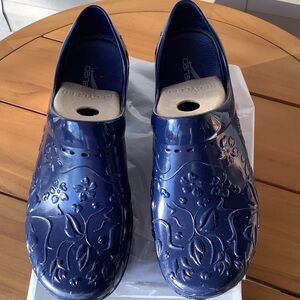 Dansko Navy Embossed Floral Clogs
